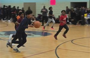  Students playing basketball
